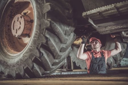 A man fixing a truck