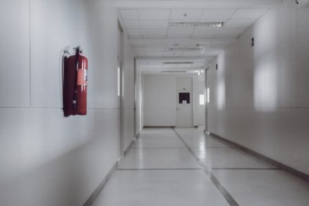 A fire extinguisher on a wall