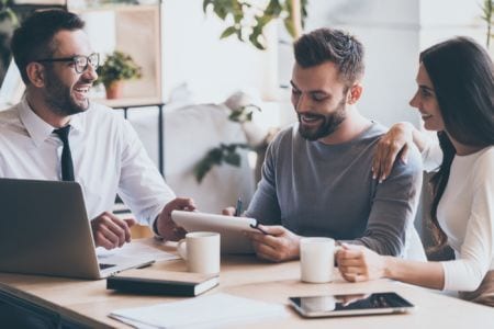 HR consultant talking to a young couple