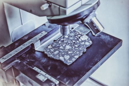 A closeup of minerals on a microscope tray