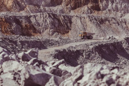 Dump-body truck in an open-cast mine.