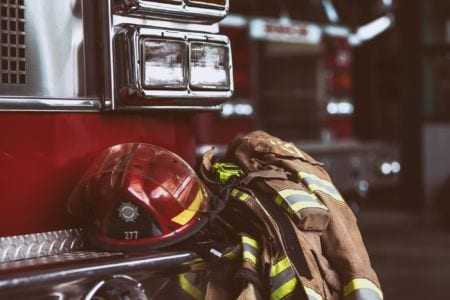 A closeup ofthe a uniform of a firefighter