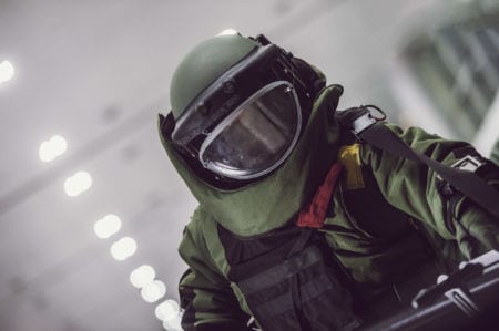 Ordnance munitions and explosives specialist wearing a special suit