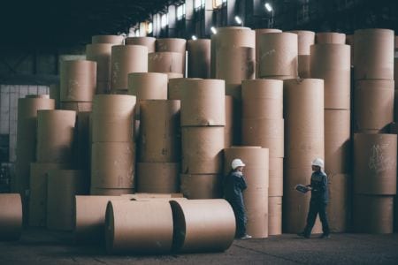 Workers in a papermaker factory