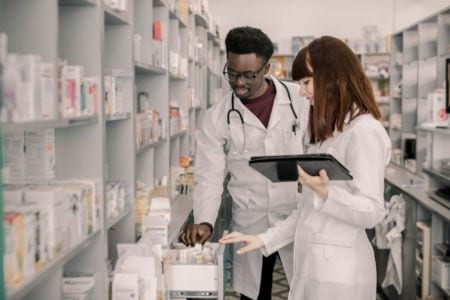 Two pharmacists in a pharmacy