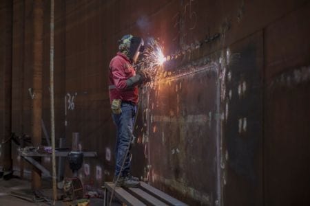 Plate welder working