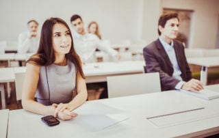 A business degree apprentice attending a seminar