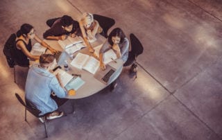 A group of students studying networking tips for apprentices