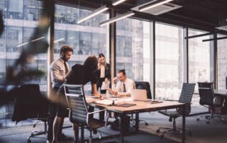 A group of people in a meeting