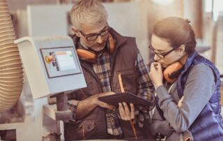 Two people discussing Apprentice Skill Development