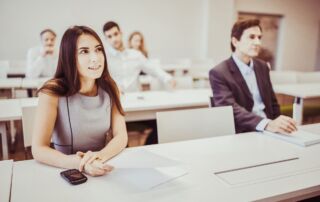 Apprentices sitting in a classroom